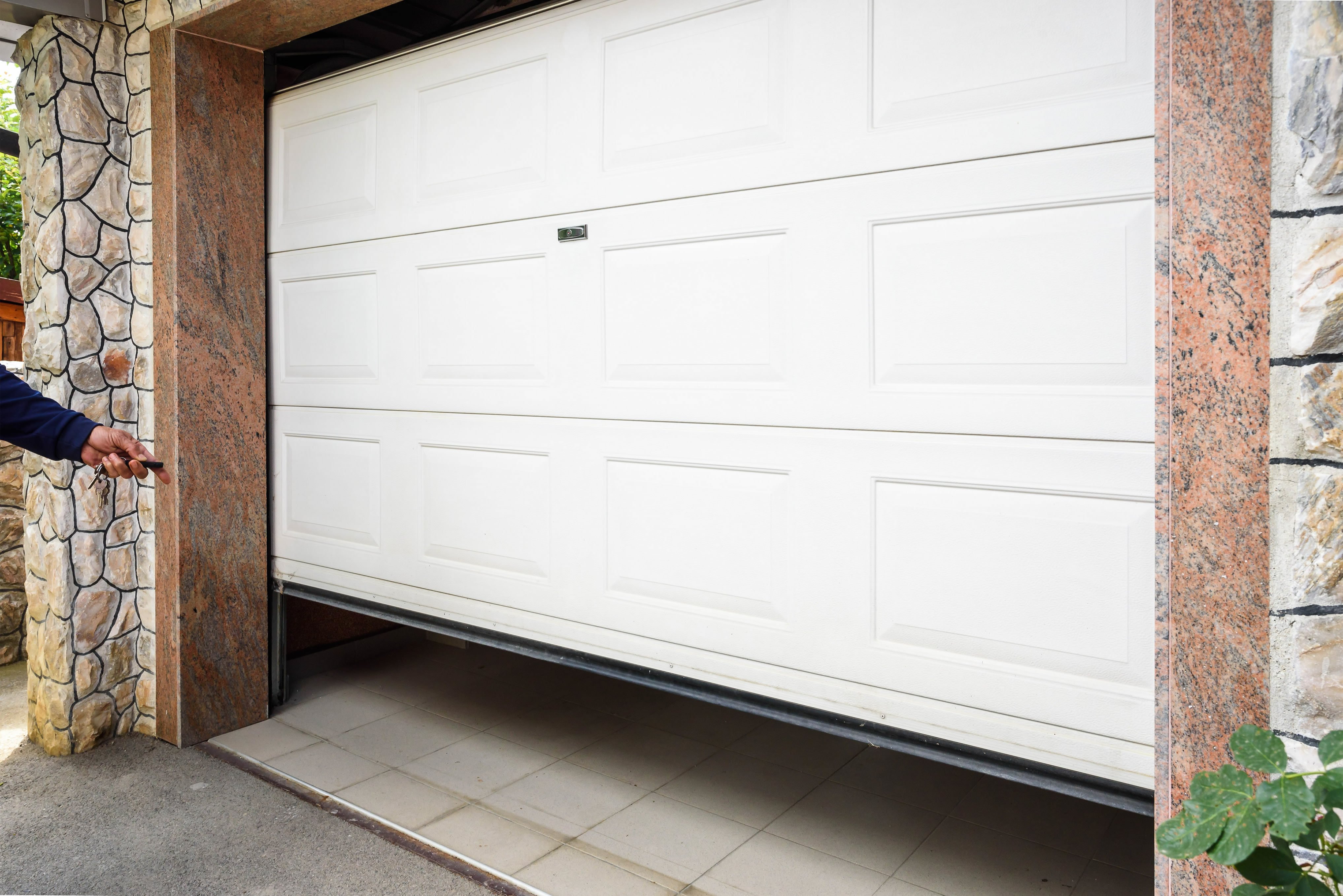 Why is My Garage Door Sticking? - Garage Door Sticking